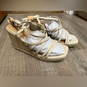 Women’s size 11 wide wedge strap shoes, color is beige/tan